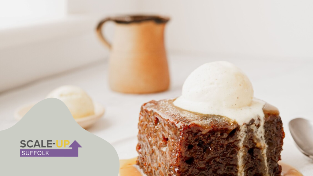 Sticky toffee pudding from Langtons in Suffolk shown on plate with ice cream. also logo for suffolk scale up.
