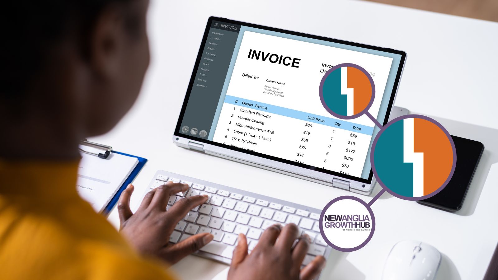 Laptop shown with hands on keypad, the screen has a loaded invoice